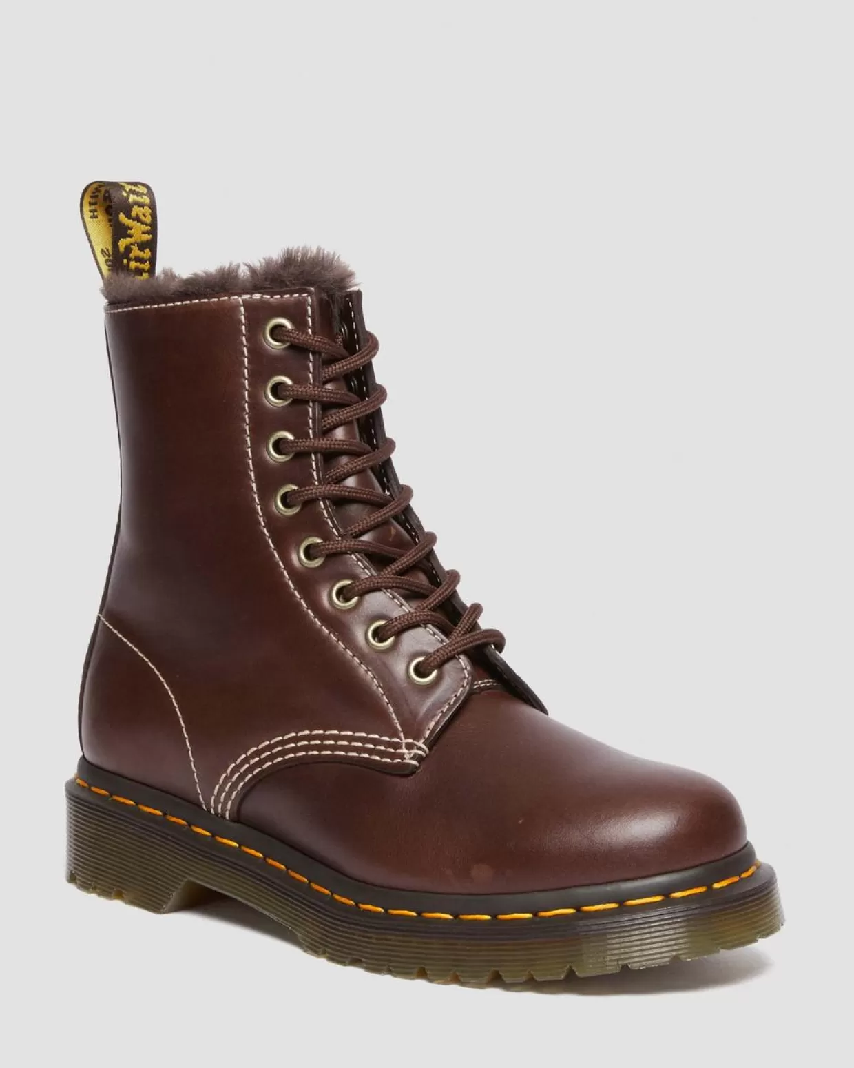 UNISEX Dr. Martens Stivali stringati 1460 Serena con rivestimento in pelliccia sintetica